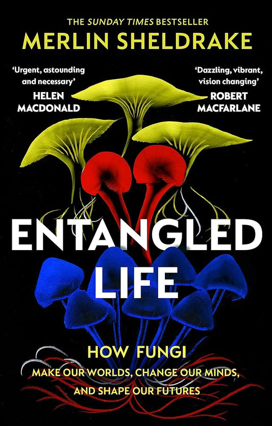 The cover of the book 'Entangled Life' featuring a colorful illustration of mushrooms with red, yellow, and blue caps against a black background.