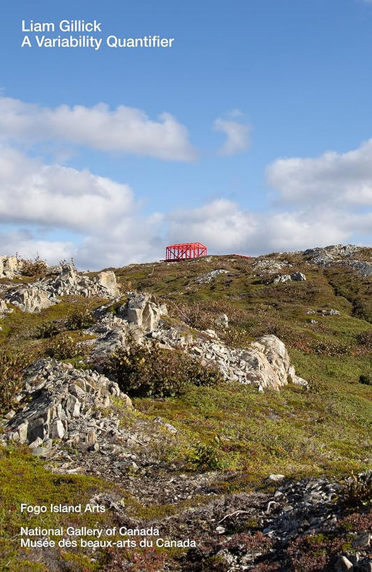 Scenic landscape with rocky terrain and a red structure on Fogo Island, Canada.