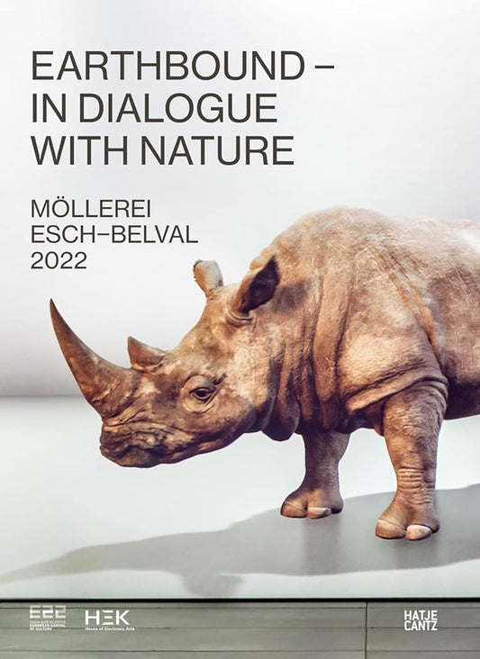 Cover of a book titled 'In Dialogue with Nature' featuring an image of a rhinoceros, indicative of the natural world theme.