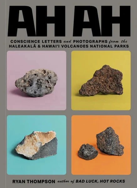 A book cover of 'AH AH: Conscience Letters and Photographs' featuring images of volcanic rocks in different colors on a yellow, pink, and blue background.