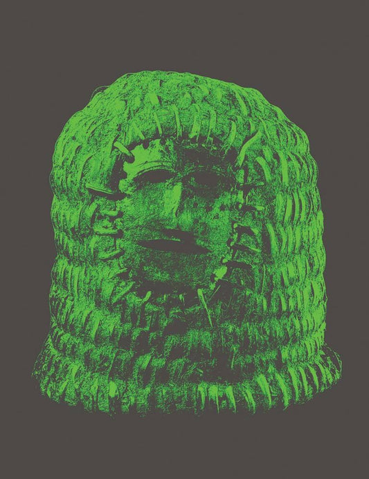 A green textured book cover resembling a mummy's head.