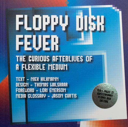 Cover of the book 'Floppy Disk Fever' featuring a blue background with pixel-style text and design elements.
