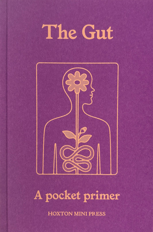 Book titled 'The Gut: A pocket primer' with a purple cover and gold illustration on Hoxton Mini Press.