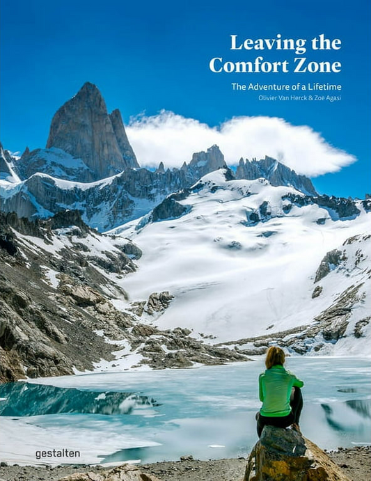 Book cover with a person sitting by a lake and snow-covered mountains, titled 'Leaving the Comfort Zone'.