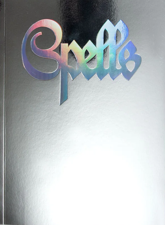 This image features the cover of a book titled "Spells". The cover is strikingly designed with a modern, minimalist aesthetic.