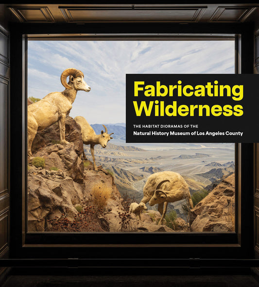 Framed exhibit of habitat dioramas with rams on rocks, featuring 'Fabricating Wilderness' text.